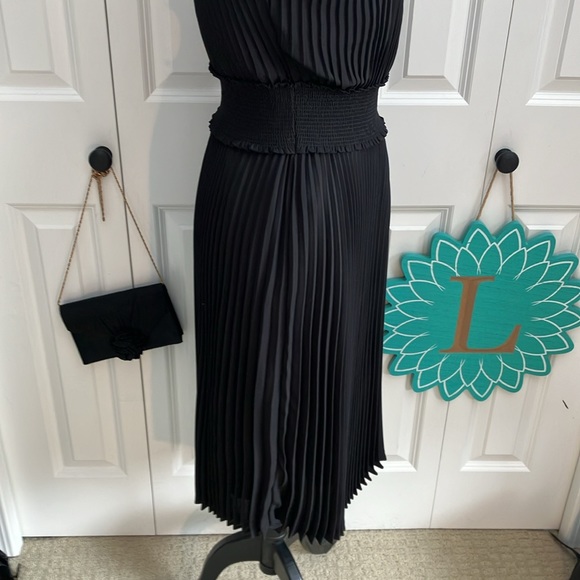 Fabulous LBD blouson dress featuring a smocked waist & accordion pleats - Picture 7 of 15